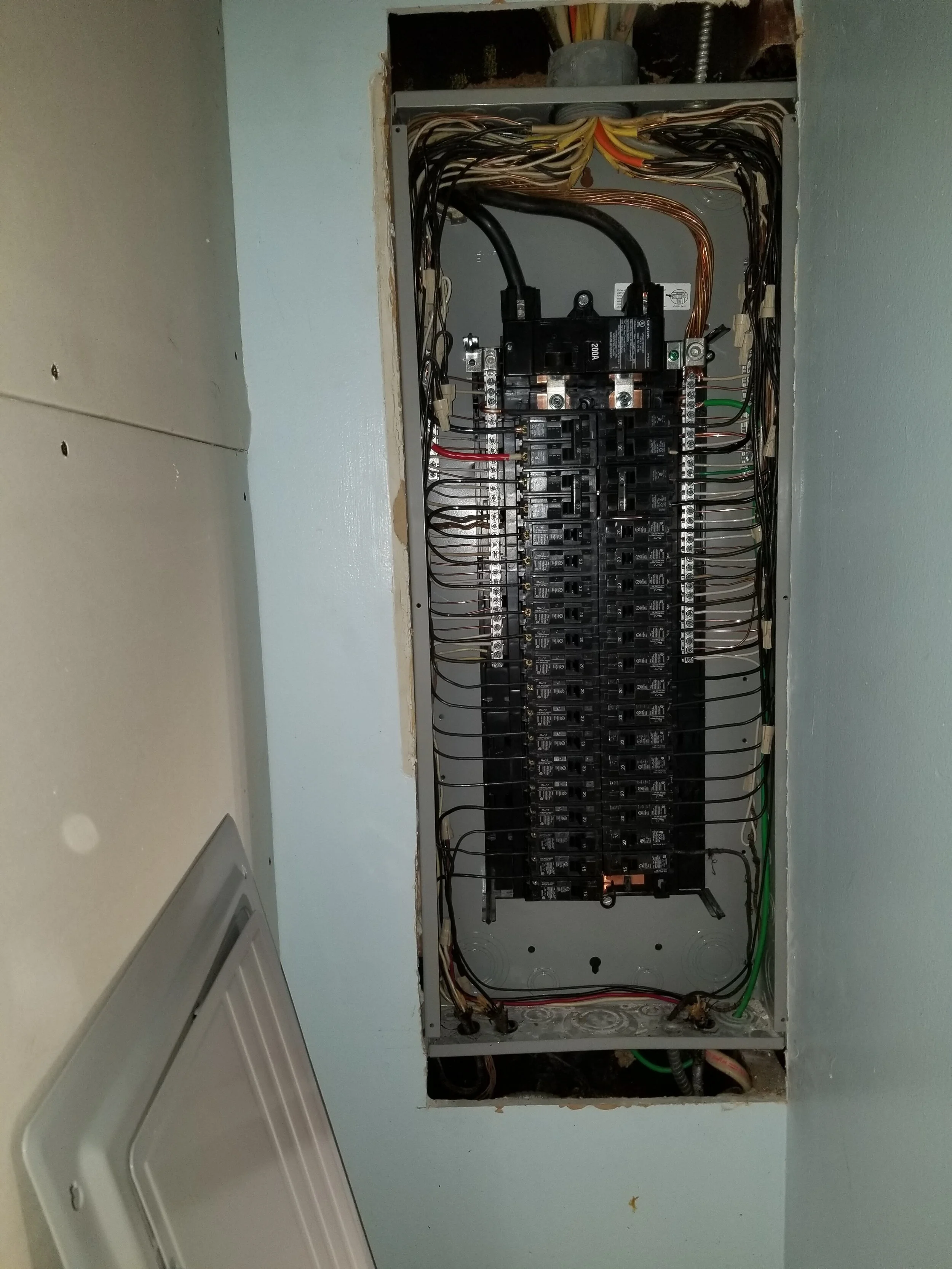 After: completed electrical work by Newman Electric